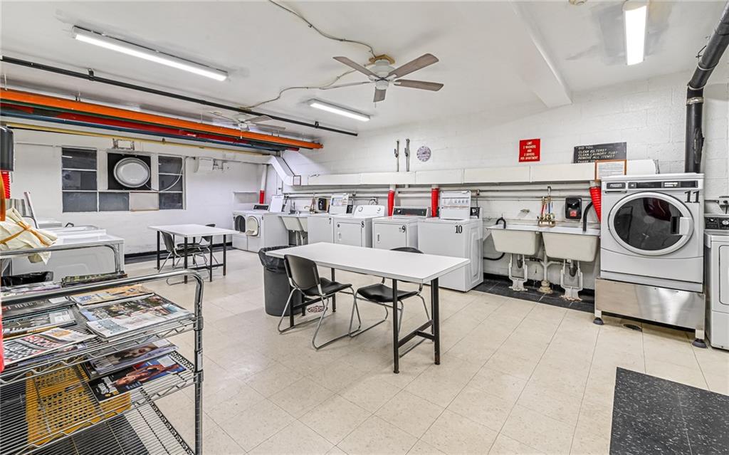 4601 Fifth Avenue, Unit 322 Pittsburgh, PA 15213 - Photo 16 of 18 a storage room with table and chairs