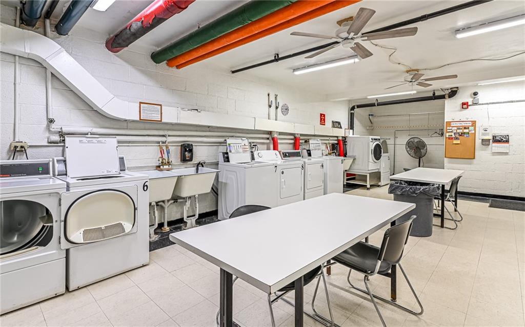 4601 Fifth Avenue, Unit 322 Pittsburgh, PA 15213 - Photo 26 of 27 a utility room with dryer and washer