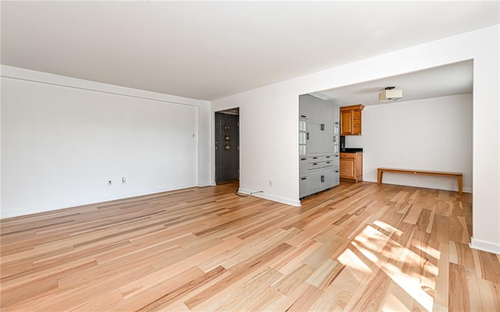 4601 Fifth Avenue, Unit 322 Pittsburgh, PA 15213 - Photo 9 of 27 a view of a room with wooden floor and cabinet