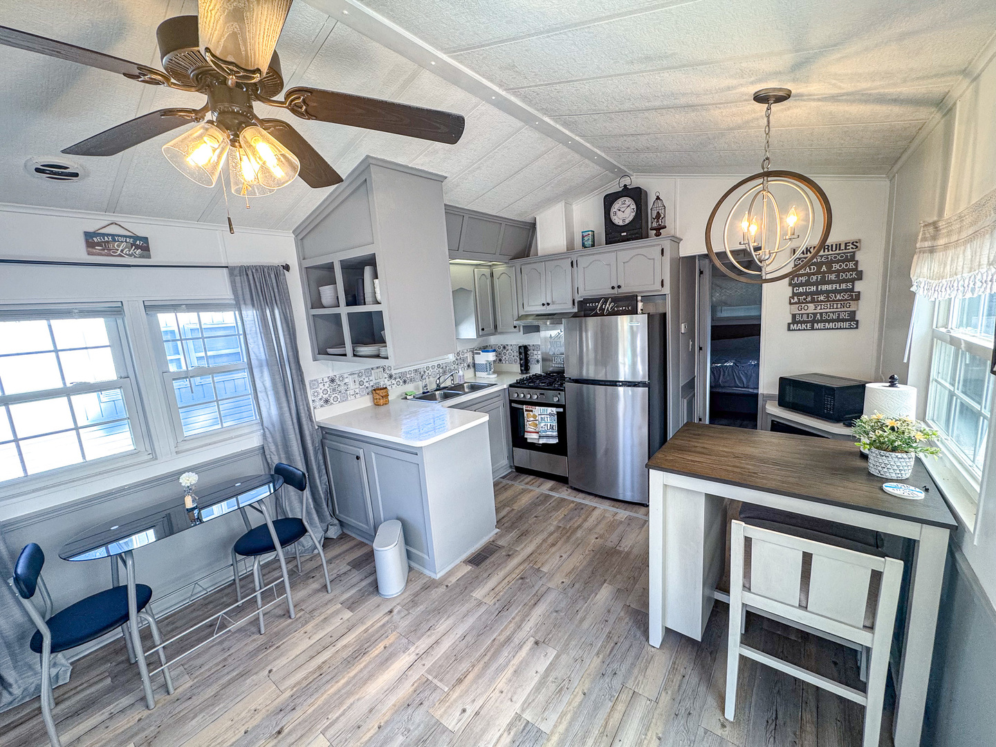 4-2 Woodhaven Sublette, IL 61367 - Photo 17 of 27 a view of a dining room with furniture window and wooden floor