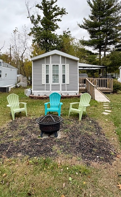 4-2 Woodhaven Sublette, IL 61367 - Photo 2 of 27 a view of a yard with a patio