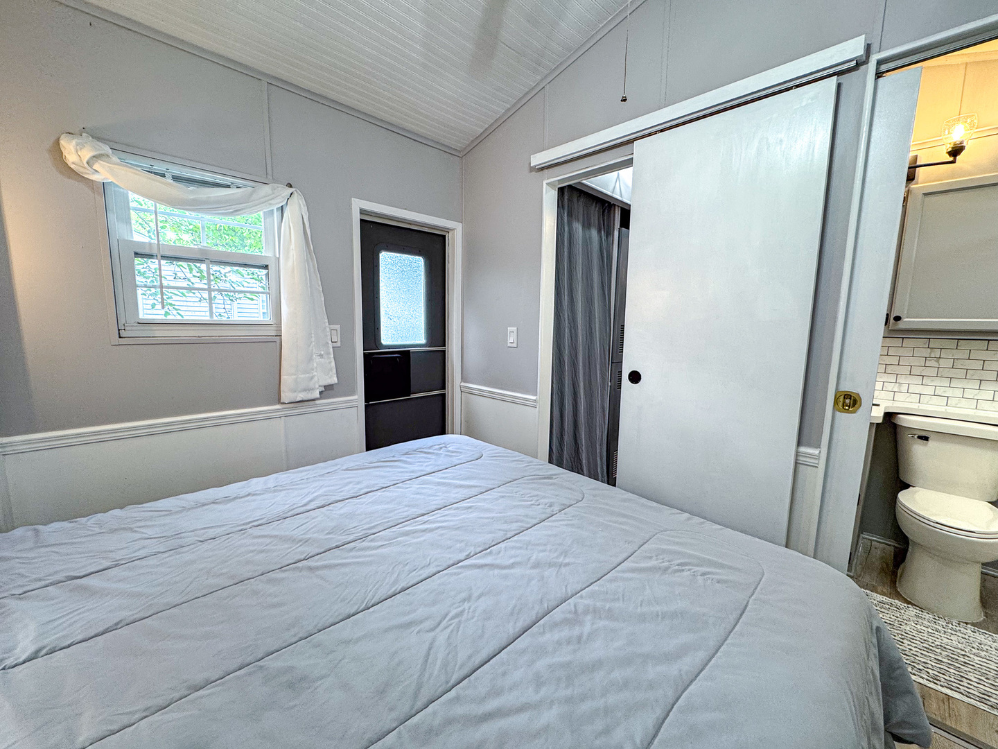 4-2 Woodhaven Sublette, IL 61367 - Photo 24 of 27 a bedroom with a bed and a window