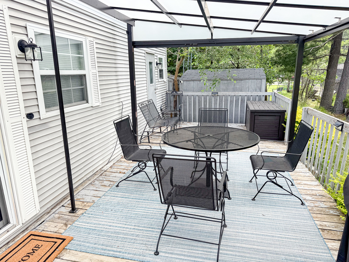 4-2 Woodhaven Sublette, IL 61367 - Photo 5 of 27 a patio with glass top table and chairs