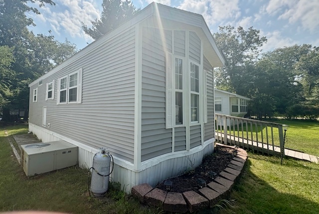 4-2 Woodhaven Sublette, IL 61367 - Photo 6 of 27 a view of a chair and tables in the backyard