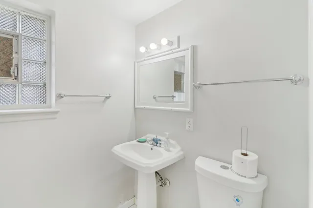 a bathroom with a shower and a bath tub