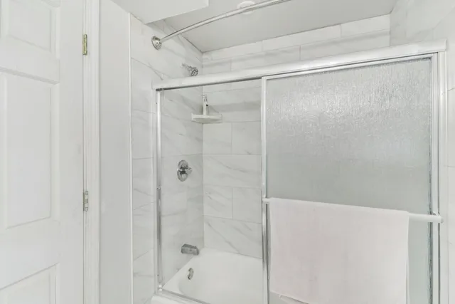 a view of a garage with rack and bicycle