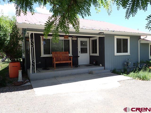 23178 U Road Cedaredge, CO 81413 - Photo 1 of 20 a view of house with outdoor space and porch