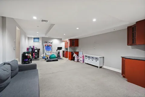 a view of a livingroom with shelves