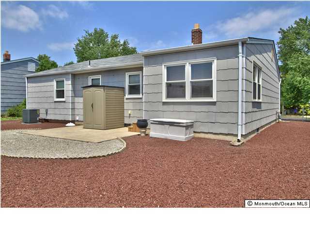 54 Oakfield Road Toms River, NJ 08757 - Photo 23 of 25 a view of a house with a yard