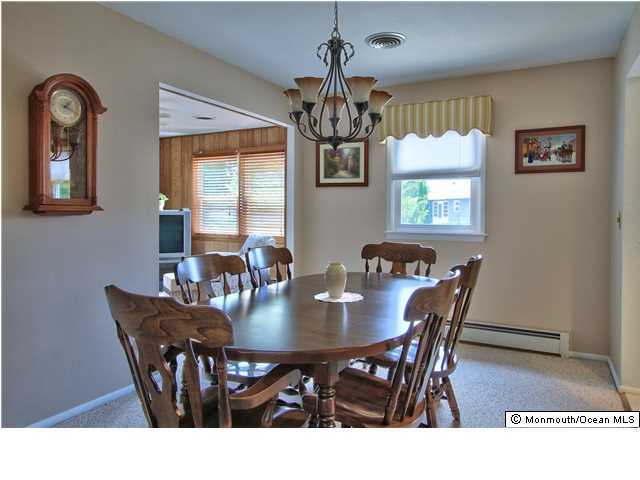 54 Oakfield Road Toms River, NJ 08757 - Photo 9 of 25 a view of a dining room with furniture and window
