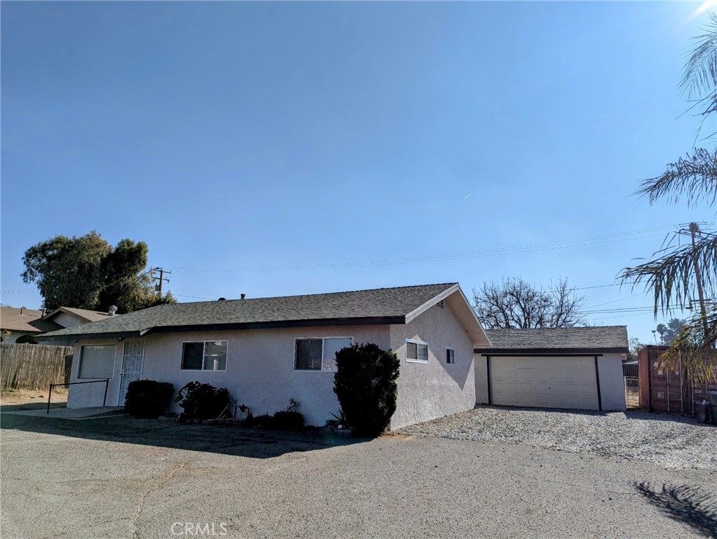 29543 Nuevo Road Nuevo, CA 92567 - Photo 1 of 1 a front view of a house with a garage