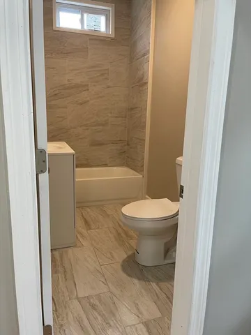 a bathroom with a sink and toilet