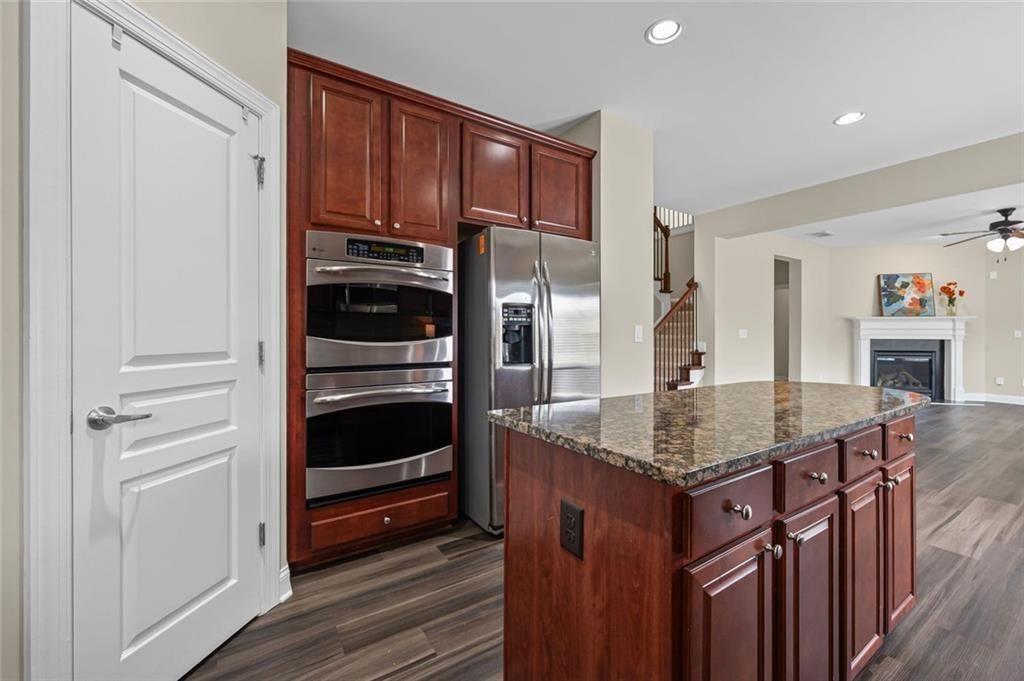 29 Lankford Road Tucker, GA 30084 - Photo 12 of 43 a kitchen with a refrigerator and countertop