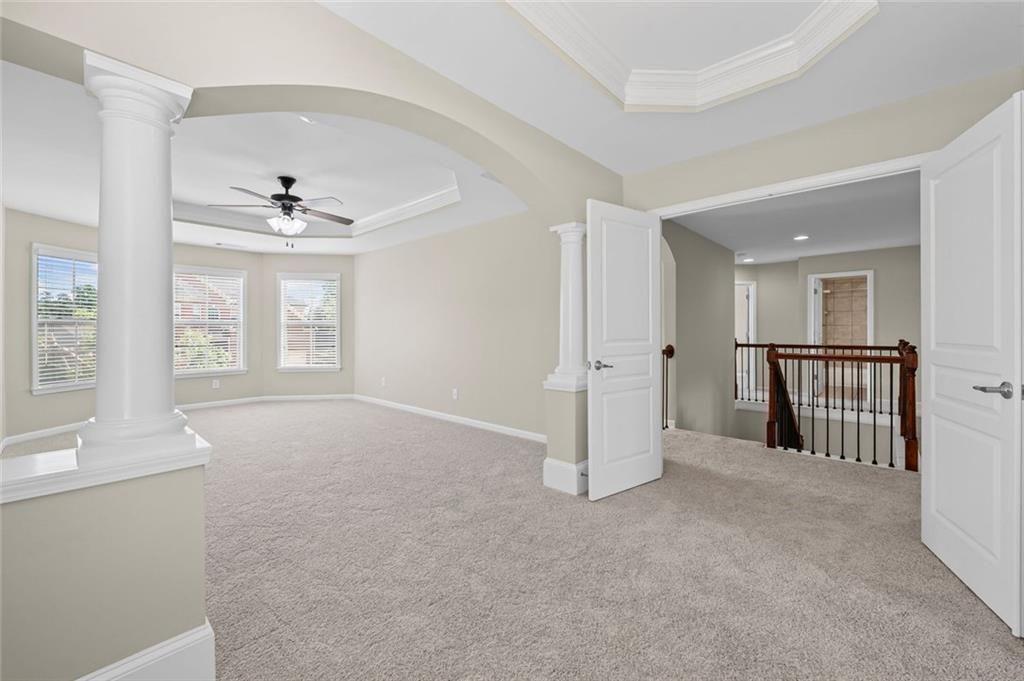 29 Lankford Road Tucker, GA 30084 - Photo 17 of 43 an empty room with windows and ceiling fan
