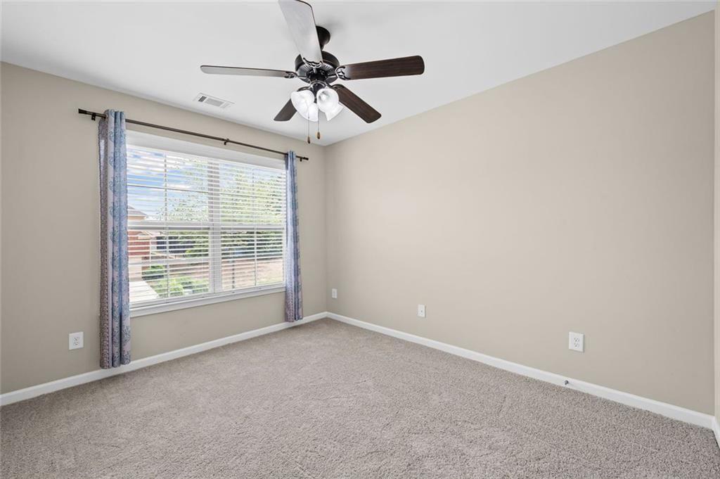 29 Lankford Road Tucker, GA 30084 - Photo 27 of 43 a view of an empty room with a window