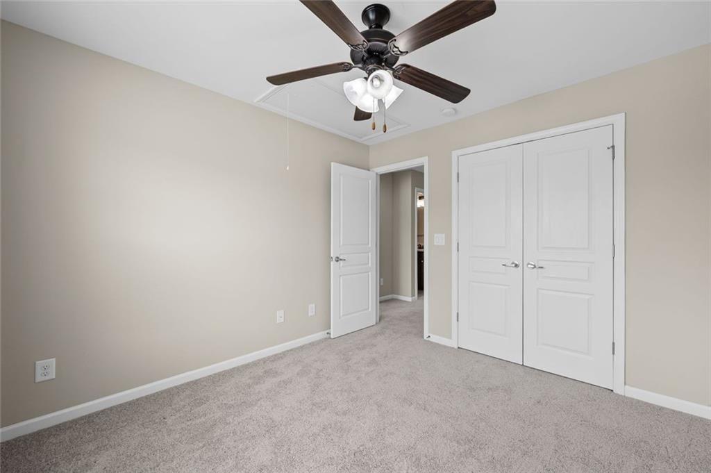 29 Lankford Road Tucker, GA 30084 - Photo 29 of 43 a view of an empty room and chandelier fan
