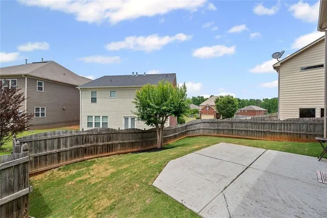 a view of a swimming pool with a lounge chairs
