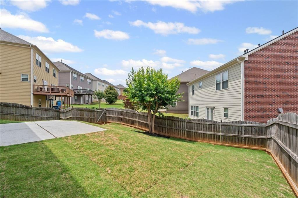 29 Lankford Road Tucker, GA 30084 - Photo 37 of 43 a view of a house with pool and sitting area