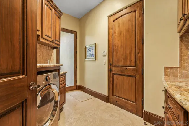 a view of a bedroom with wooden floor and closet