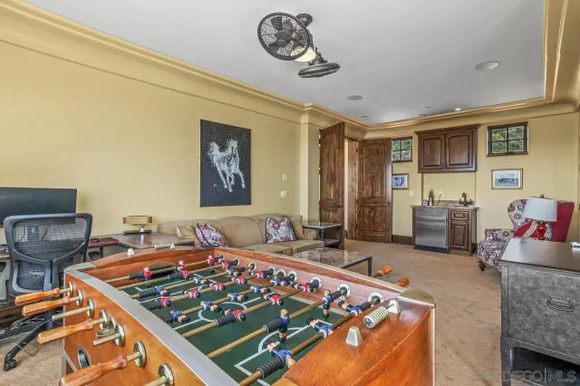 a living room with rug