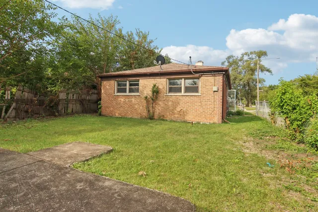 a view of a backyard with a garden