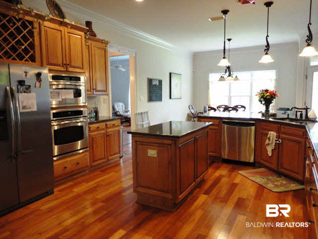 9051 Krystal Ridge Court Daphne, AL 36526 - Photo 8 of 28 Gourmet Kit with double ovens, 5 burner cook top, Chef's hood & Large walk-in pantry.