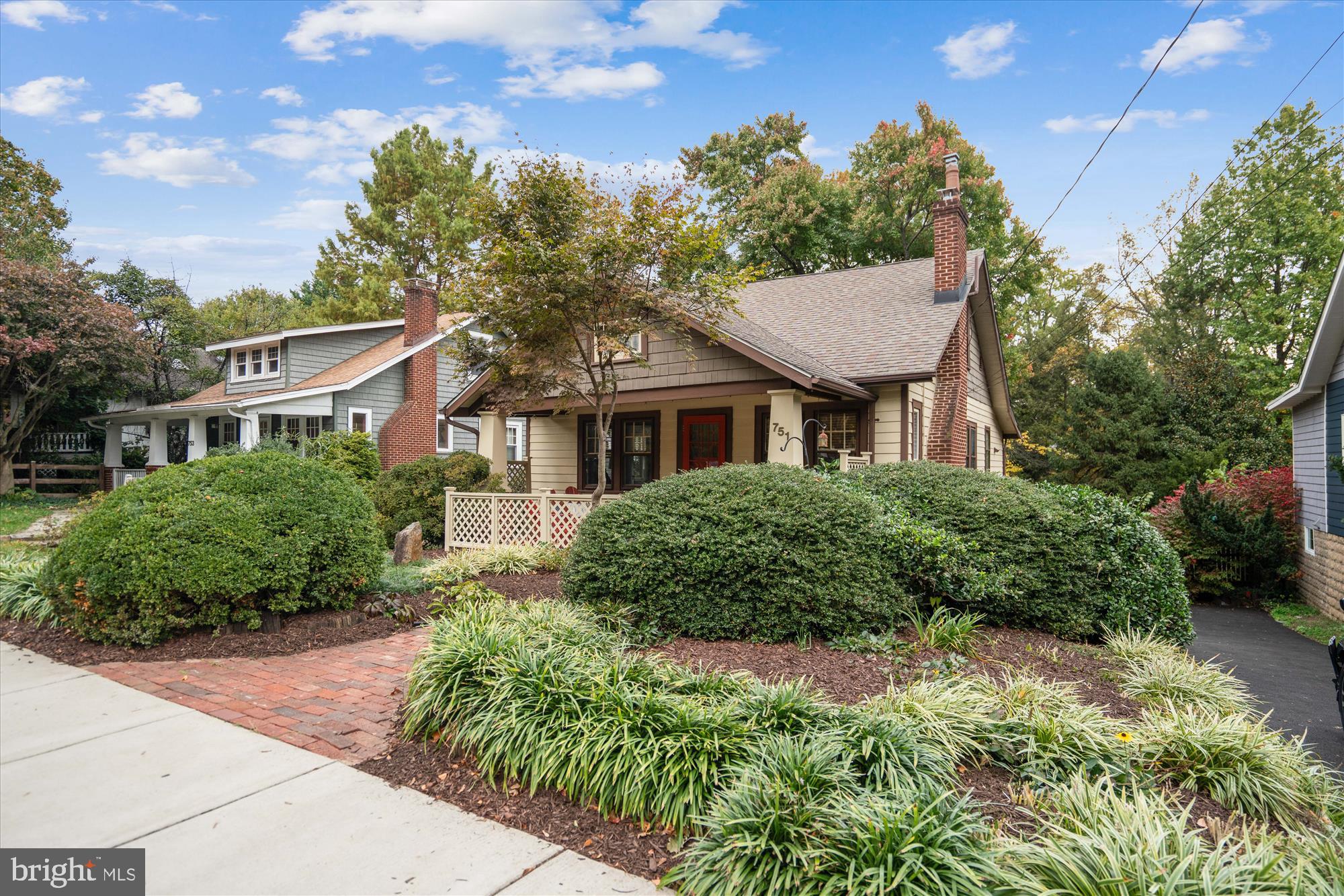 751 Silver Spring Avenue Silver Spring, MD 20910 - Photo 3 of 71 a front view of a house with a yard