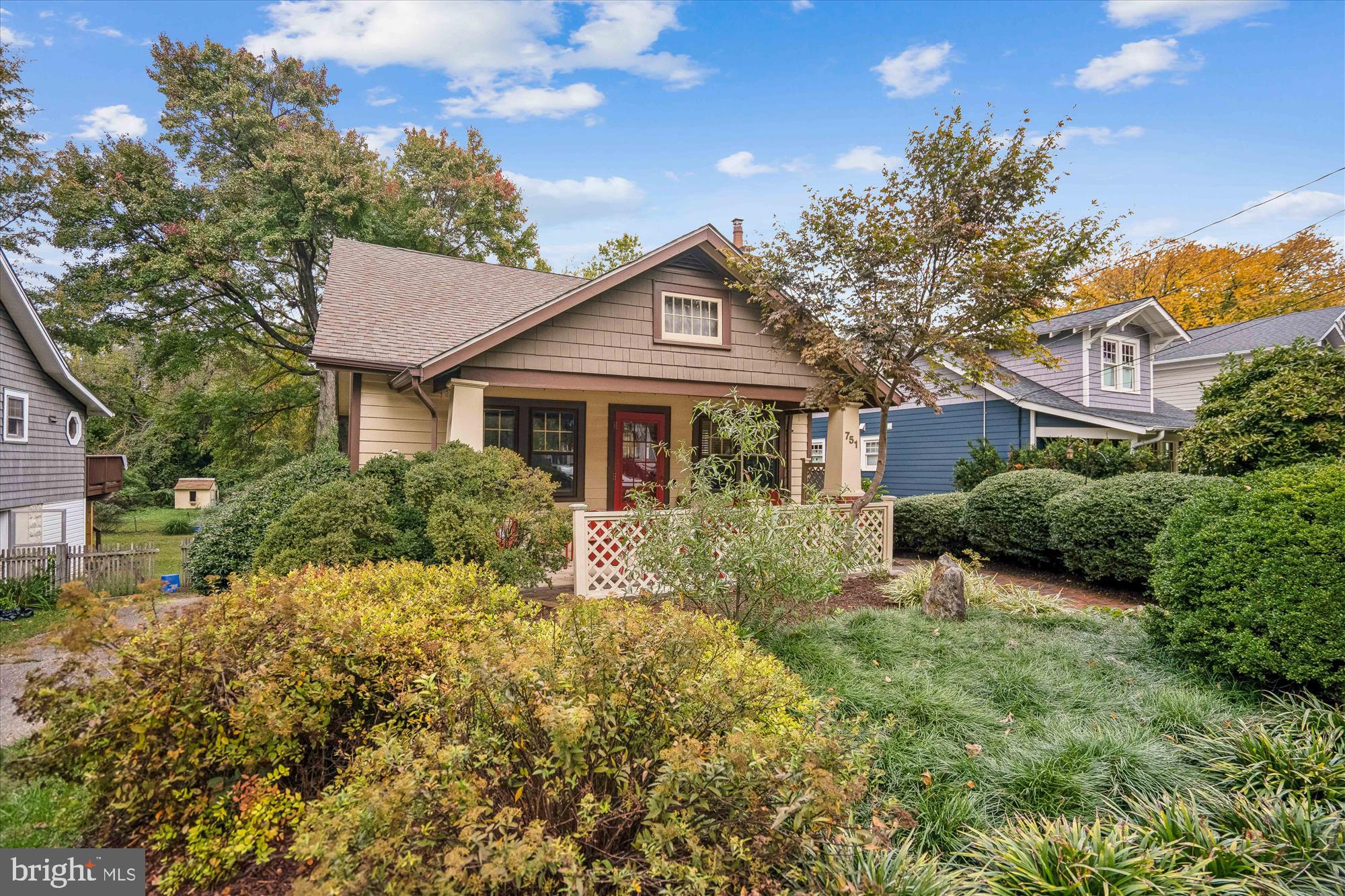 751 Silver Spring Avenue Silver Spring, MD 20910 - Photo 5 of 71 a front view of a house with a yard and trees