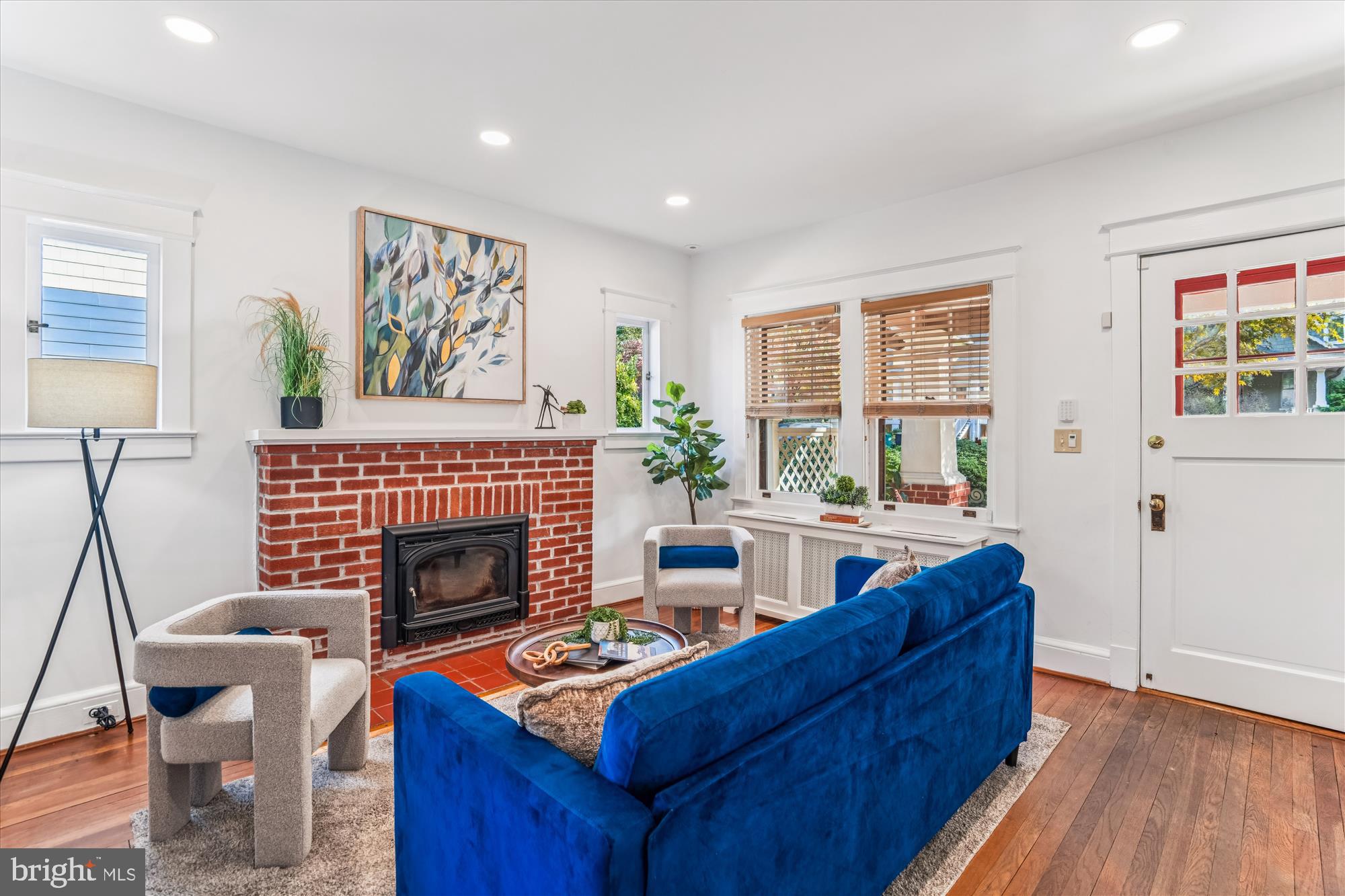 751 Silver Spring Avenue Silver Spring, MD 20910 - Photo 10 of 71 a living room with furniture and a fireplace