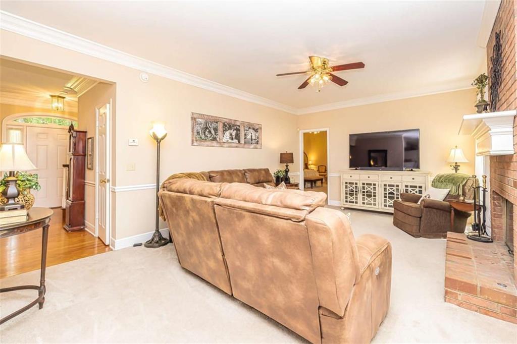 6009 Big A Road Douglasville, GA 30135 - Photo 11 of 50 a living room with furniture and a flat screen tv
