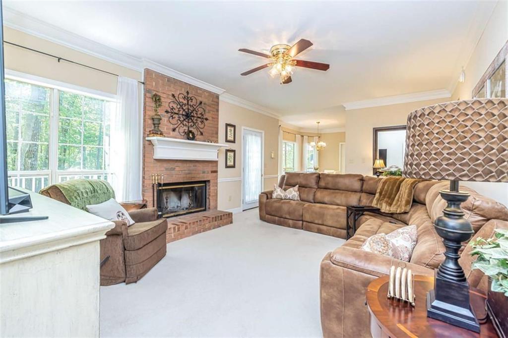 6009 Big A Road Douglasville, GA 30135 - Photo 17 of 50 a living room with furniture and a fireplace