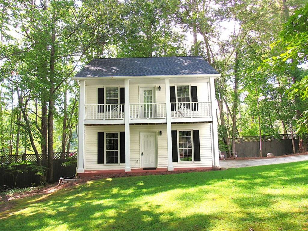 6009 Big A Road Douglasville, GA 30135 - Photo 35 of 50 front view of a house with a yard