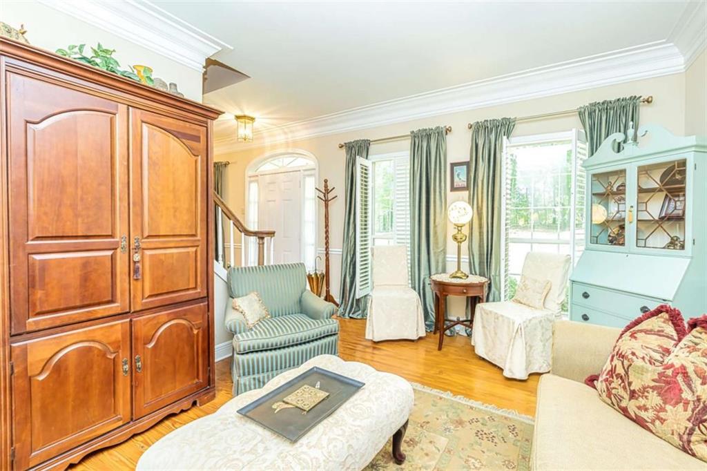 6009 Big A Road Douglasville, GA 30135 - Photo 6 of 50 a living room with furniture and a large window
