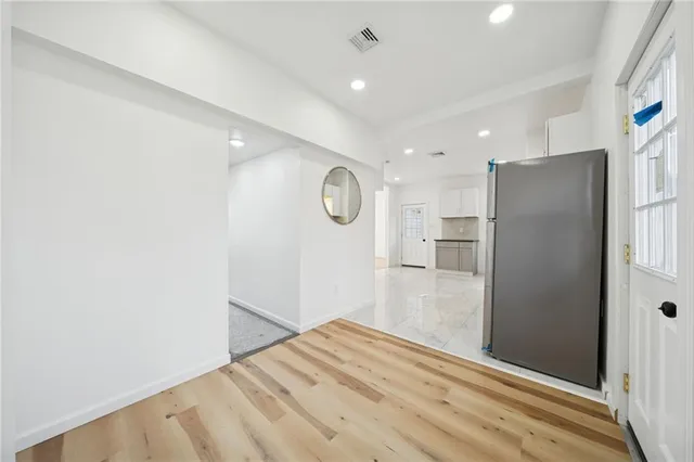 a view of kitchen and a window