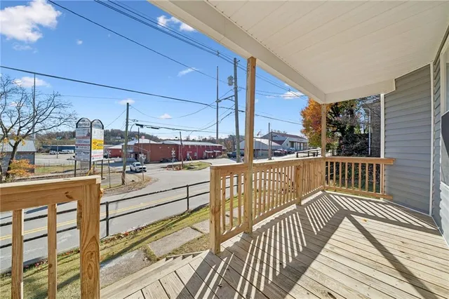 a view of a balcony with city view