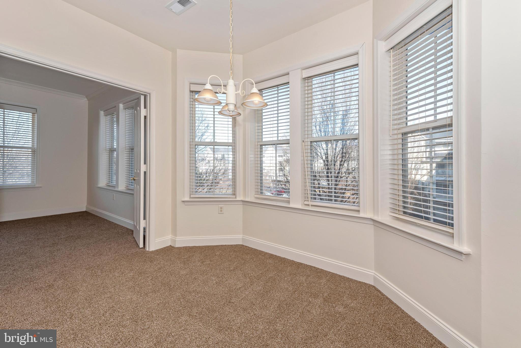 2500 Waterside Drive, Unit 315 Frederick, MD 21701 - Photo 18 of 42 Breakfast room - entrance to second master suite.