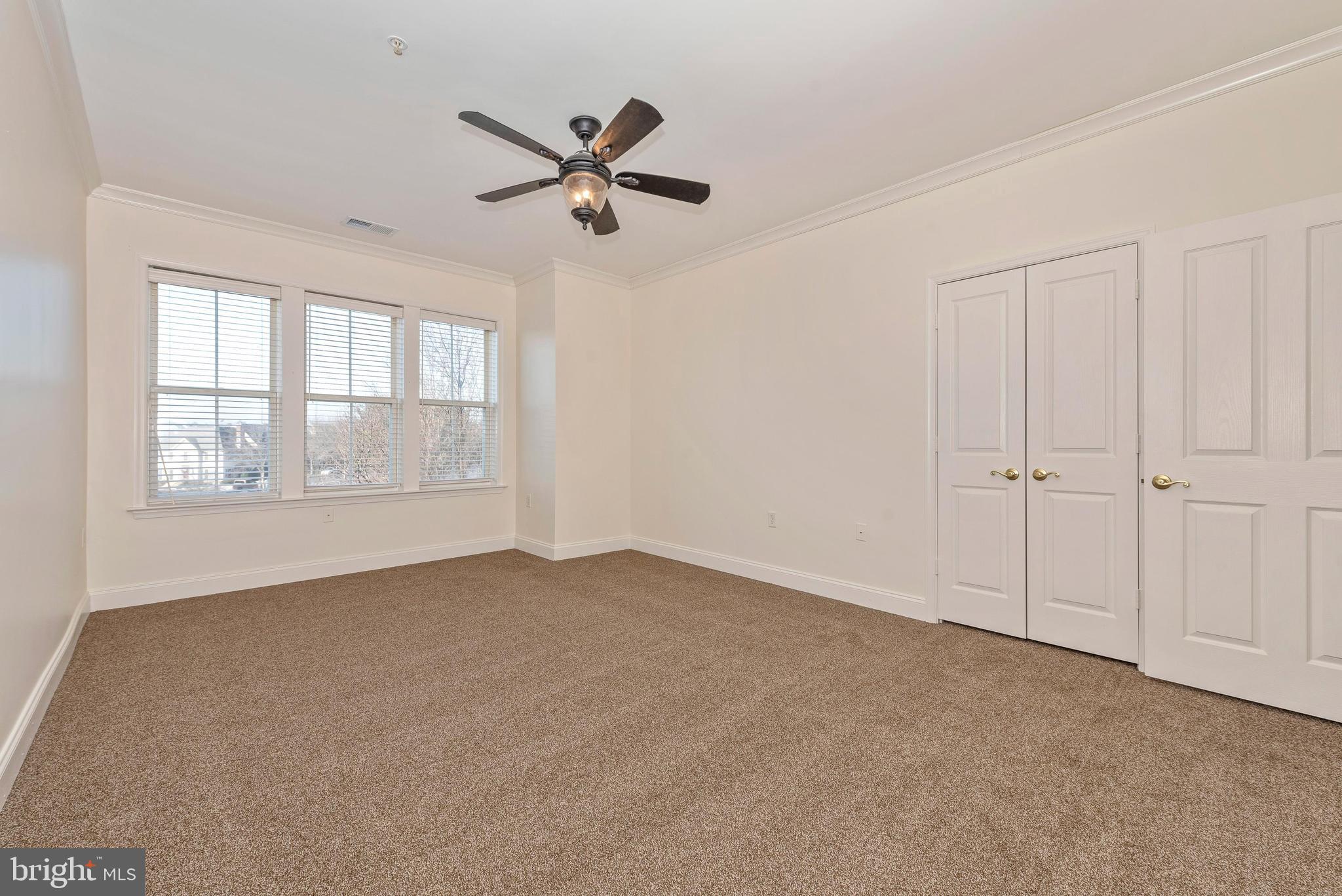 2500 Waterside Drive, Unit 315 Frederick, MD 21701 - Photo 19 of 42 Master bedroom with ceiling fan.