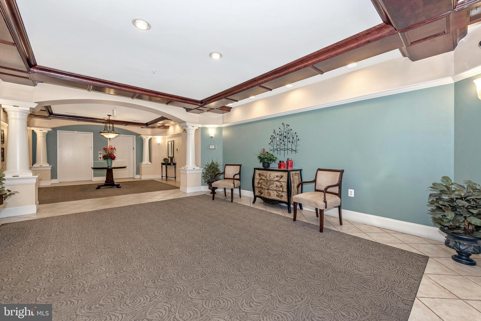 2500 Waterside Drive, Unit 315 Frederick, MD 21701 - Photo 3 of 42 Inviting foyer of controlled access building.