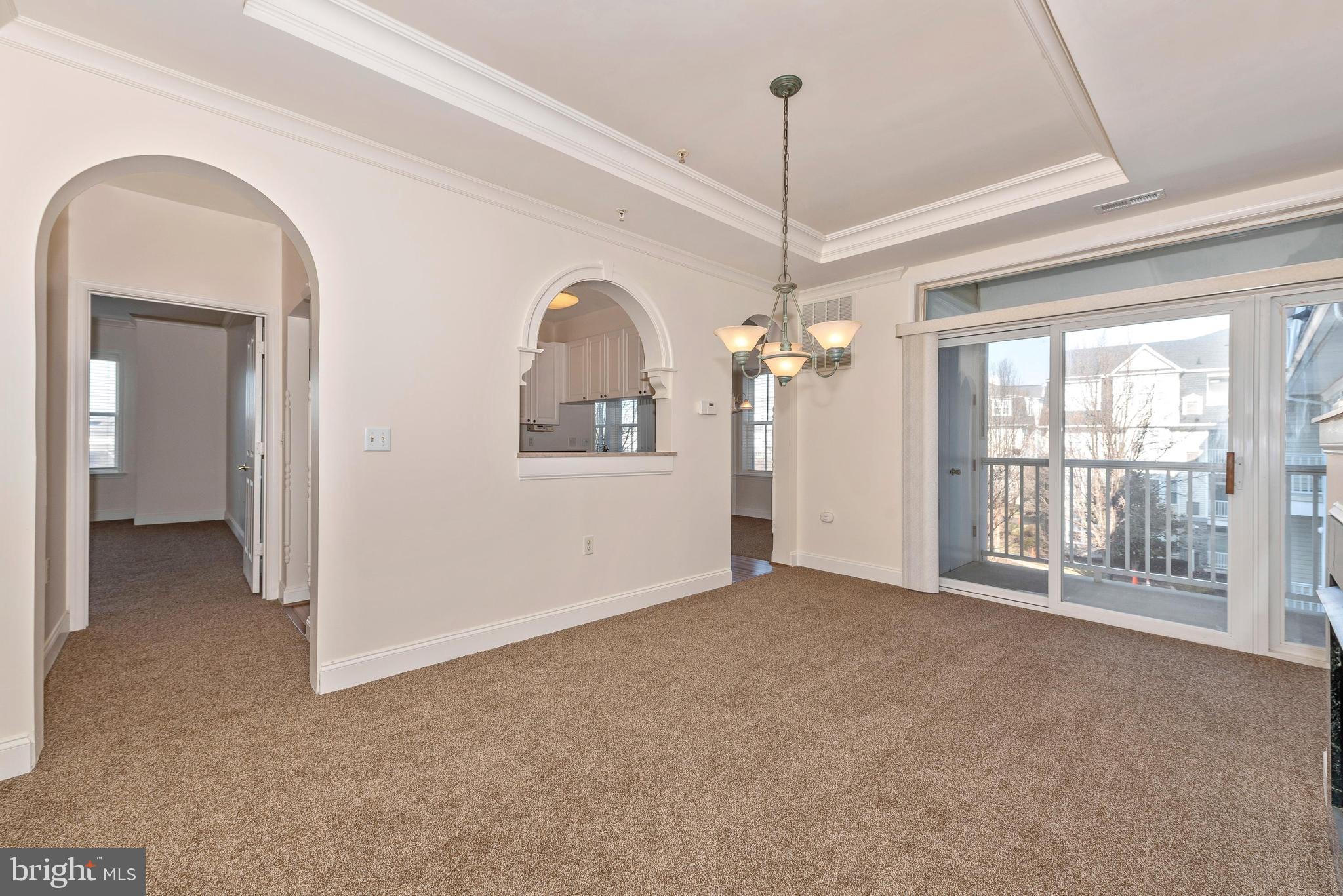 2500 Waterside Drive, Unit 315 Frederick, MD 21701 - Photo 9 of 42 Dining room with large door to private patio.
