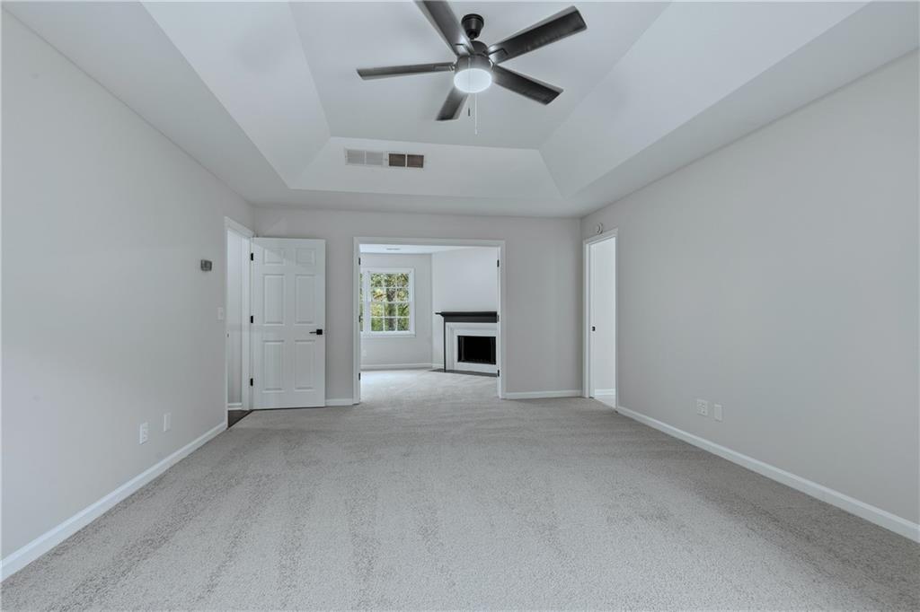 2800 Lakewind Court Alpharetta, GA 30005 - Photo 15 of 26 an empty room with a empty space and windows