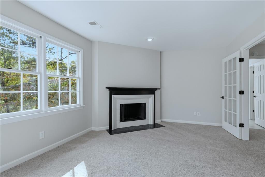2800 Lakewind Court Alpharetta, GA 30005 - Photo 19 of 26 a view of an empty room with a window