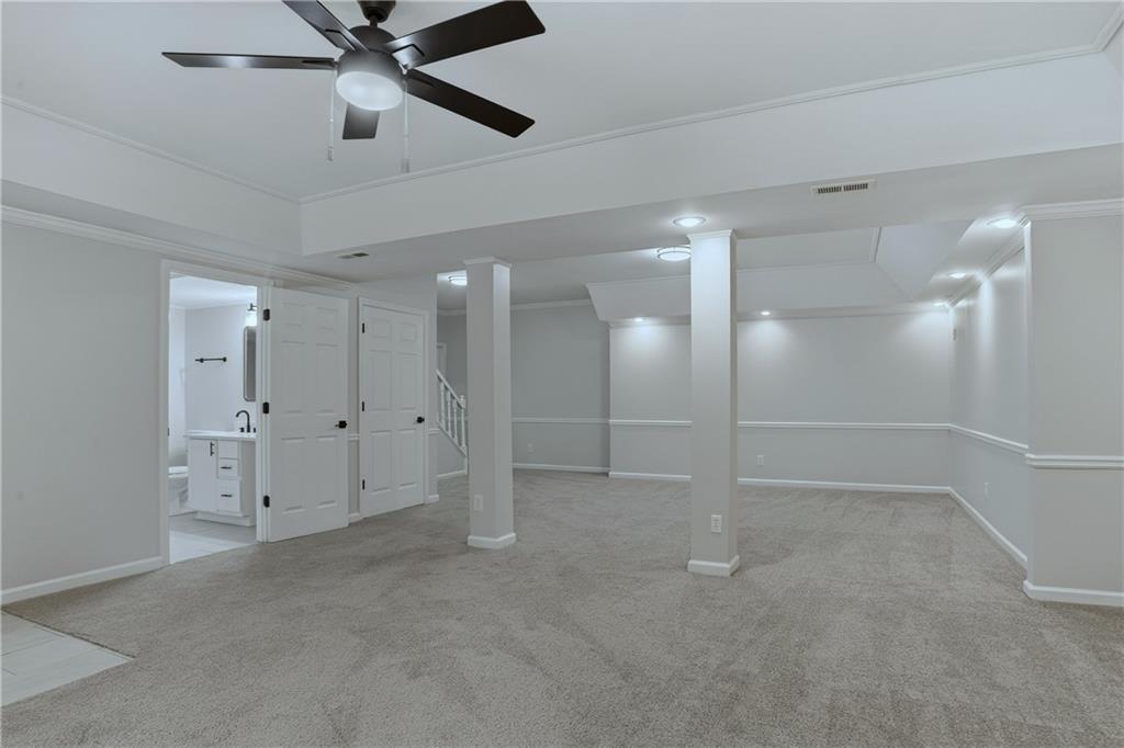 2800 Lakewind Court Alpharetta, GA 30005 - Photo 21 of 26 a view of an empty room with a ceiling fan