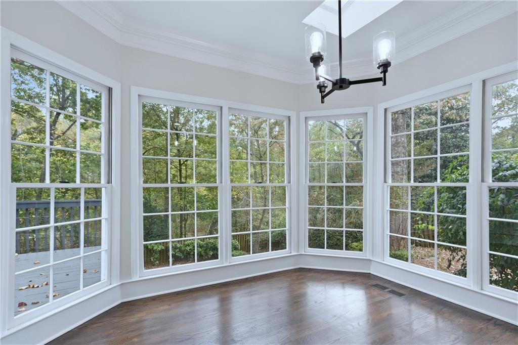 2800 Lakewind Court Alpharetta, GA 30005 - Photo 7 of 26 a view of empty room with wooden floor and fan