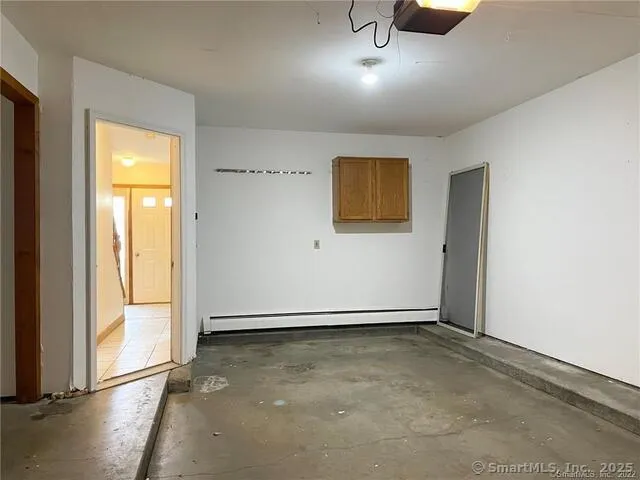 an empty room with a door
