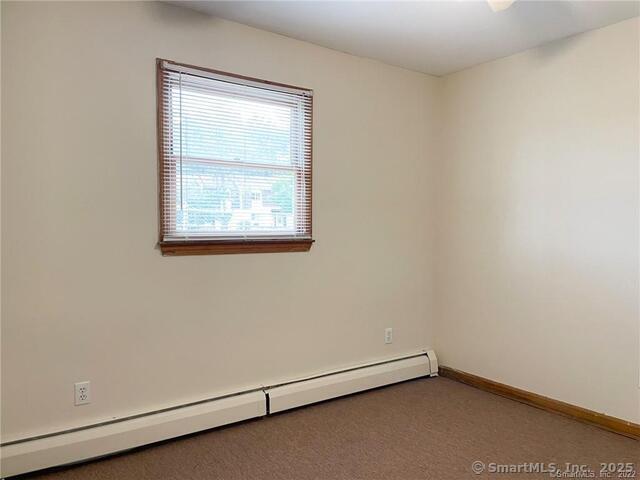 77 Marion Avenue, Unit 2 Torrington, CT 06790 - Photo 14 of 35 an empty room with a window