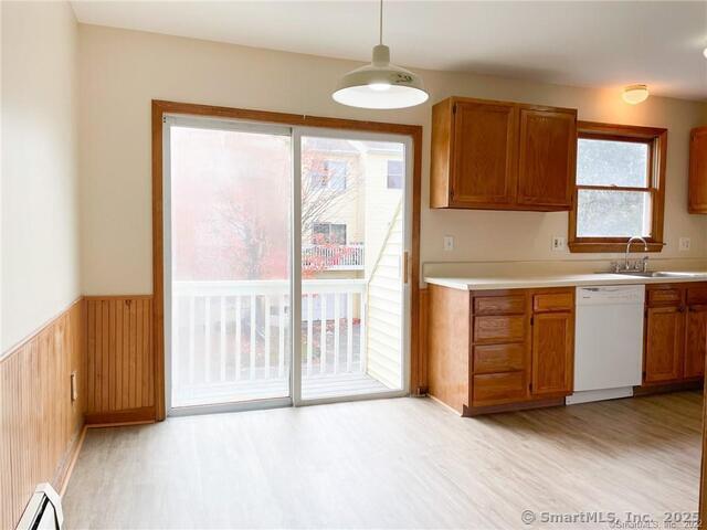 77 Marion Avenue, Unit 2 Torrington, CT 06790 - Photo 4 of 35 a view of an empty room with a window