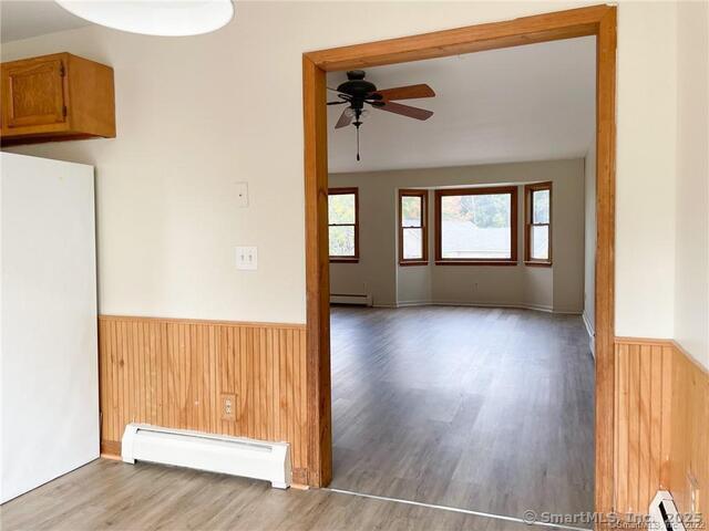 77 Marion Avenue, Unit 2 Torrington, CT 06790 - Photo 10 of 35 a view of livingroom with hardwood