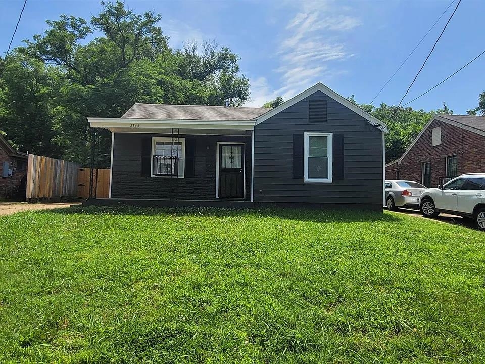 2344 Warren Street Memphis, TN 38106 - Photo 1 of 9 a view of a house with a yard