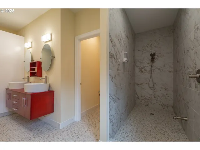 a bathroom with shower bathtub and sink