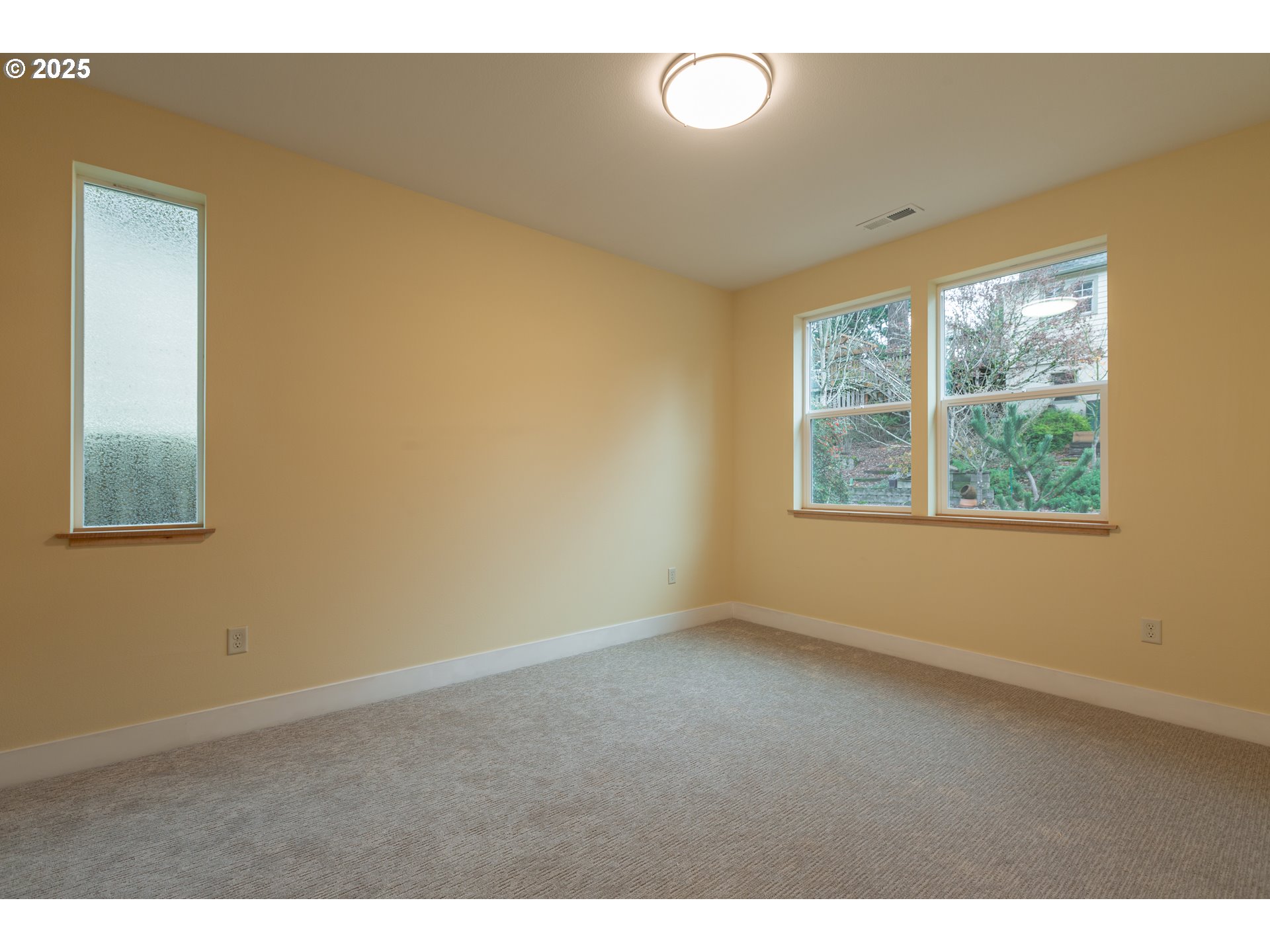 15427 Southeast River Road Oak Grove, OR 97267 - Photo 23 of 30 an empty room with windows